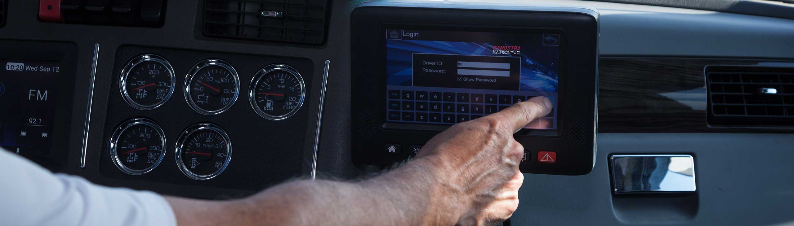 Bandstra driver using Electronic Log Device on dashboard