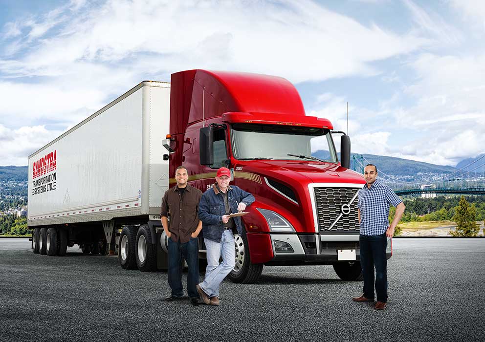 Bandstra drivers standing in front of highway truck in British Columbia